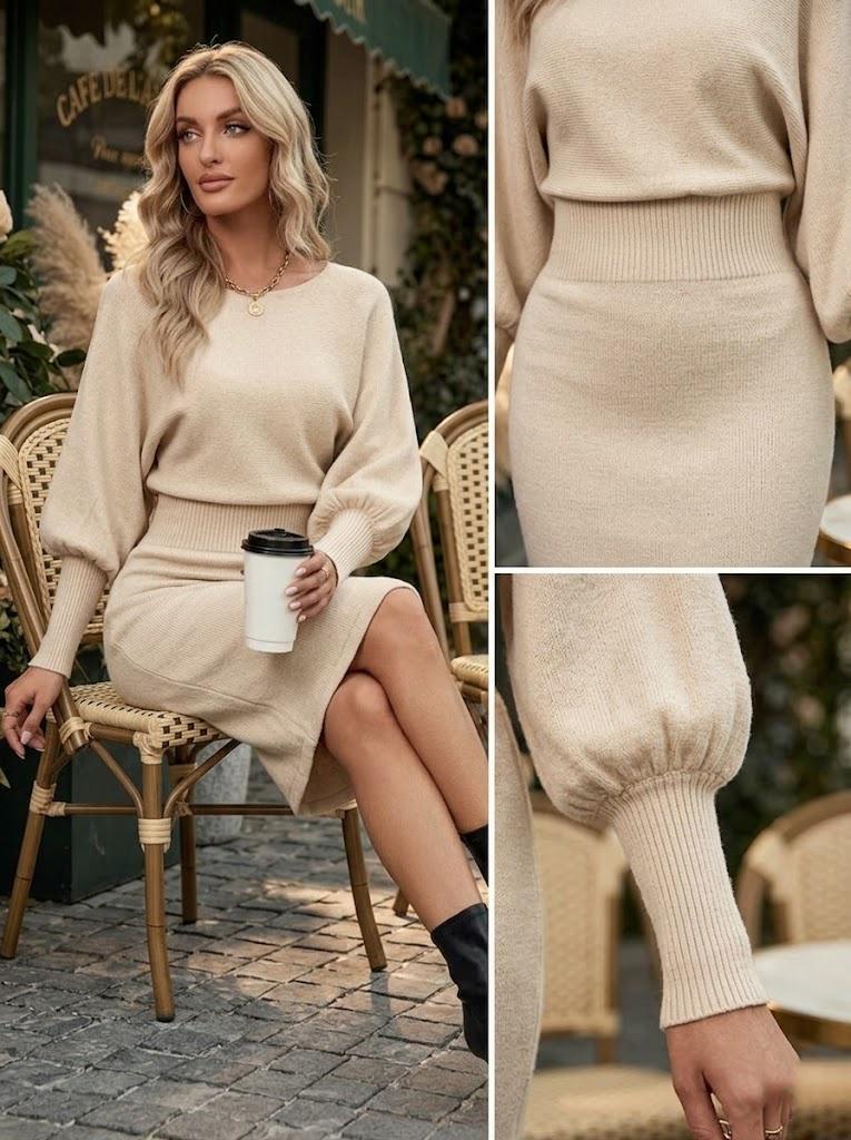 May include: A beige knit dress featuring a round neckline, long balloon sleeves with ribbed cuffs, and a wide ribbed waistband. The garment has a fitted skirt section and a relaxed bodice, crafted from a soft, solid-colored knit fabric.